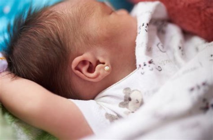 What age should a boy get their ears pierced?