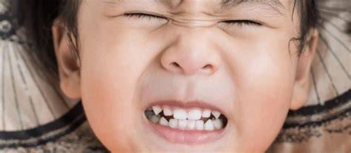 Why is my child grinding her teeth?